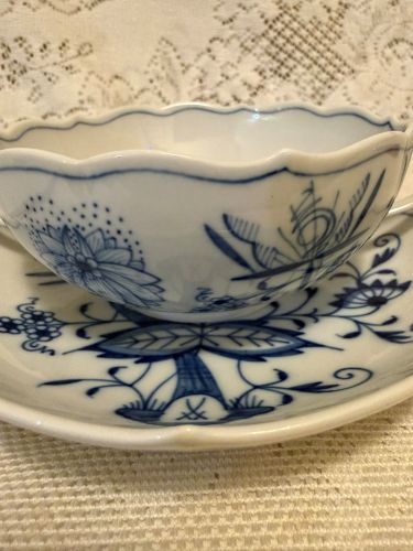 Set of eight rare cream soup bowls and saucers each having two handles. Set of eight rare cream soup bowls and saucers each having two handles.